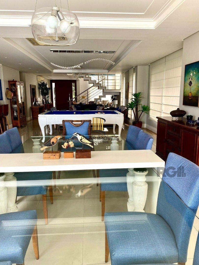 Casa de Condomínio 4 dormitórios no bairro Atlântida