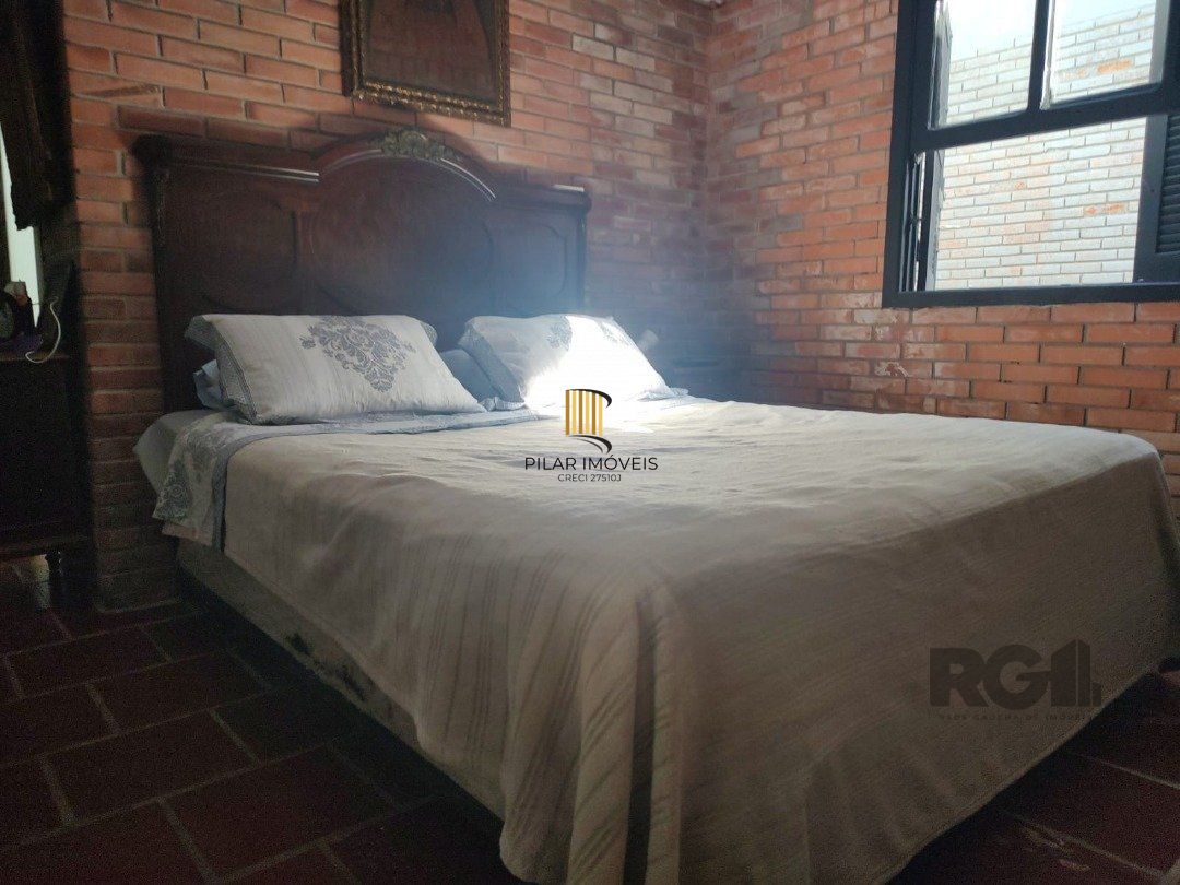Casa 5 dormitórios no bairro Atlântida