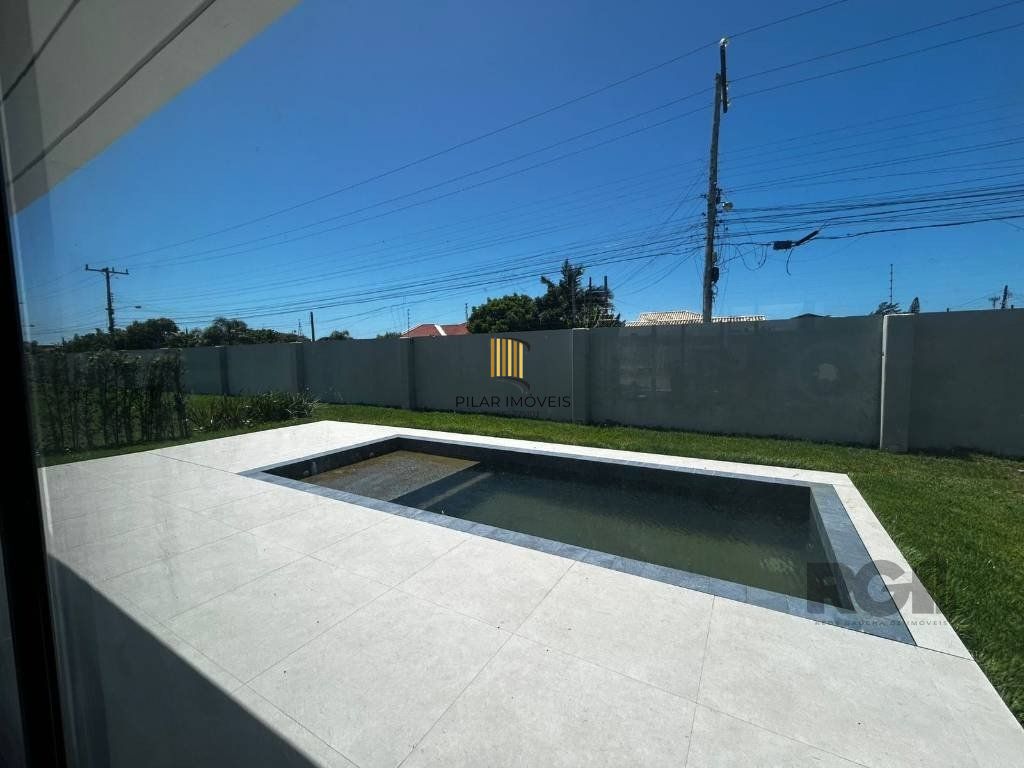 Casa de Condomínio 5 dormitórios no bairro Atlântida Sul