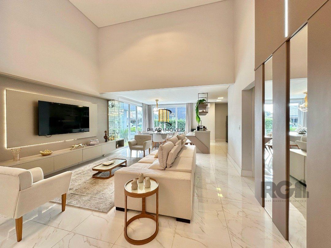 Casa de Condomínio 4 dormitórios no bairro Dubai