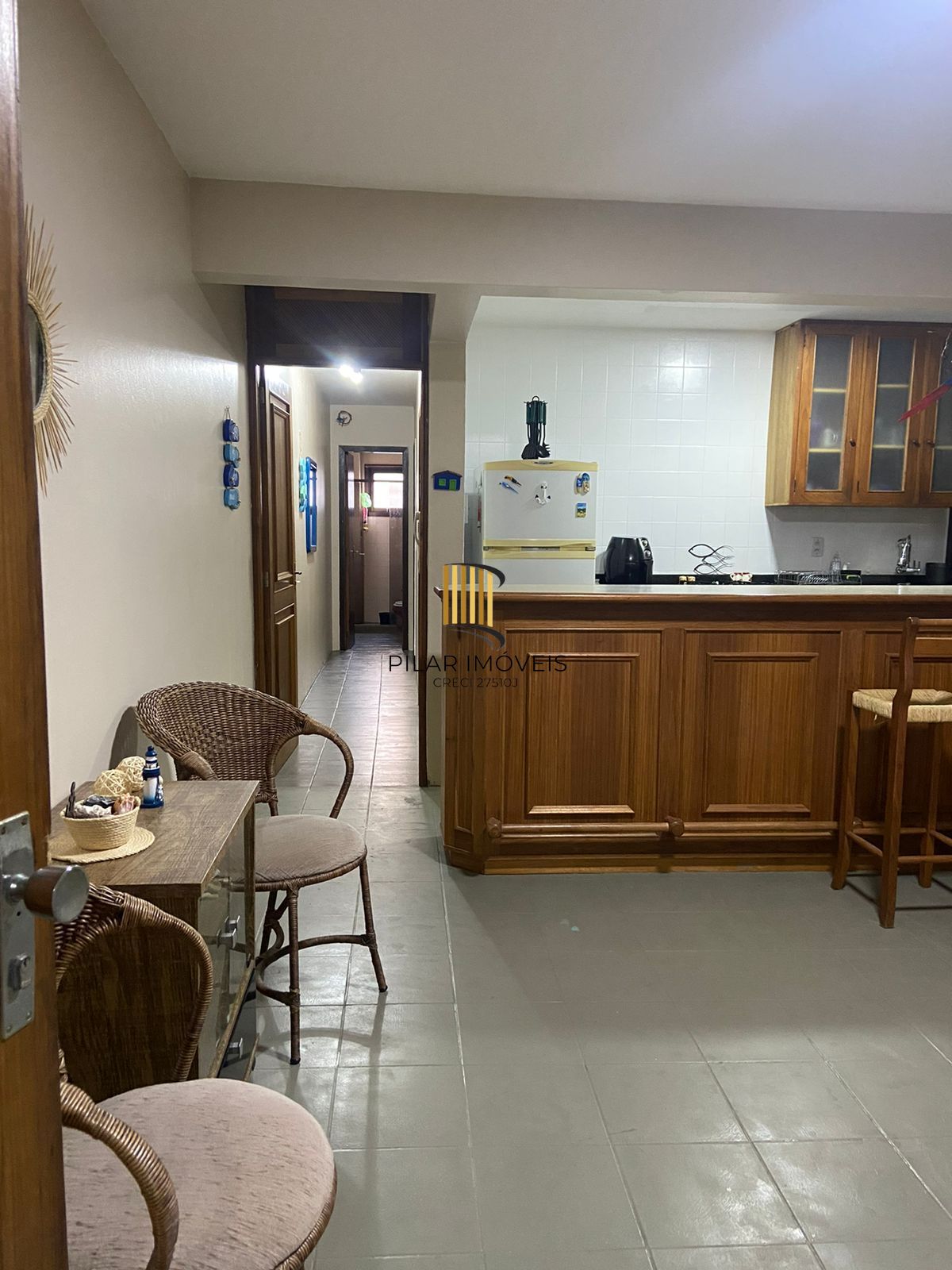 Apartamento com 2 dormitórios e garagem em Torres