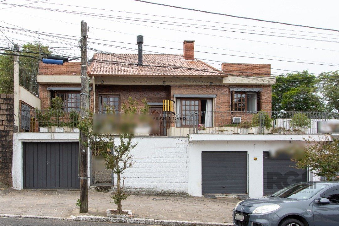 Casa para Venda - 440m², 3 dormitórios, sendo 1 suites, 2 vagas - Santa Tereza