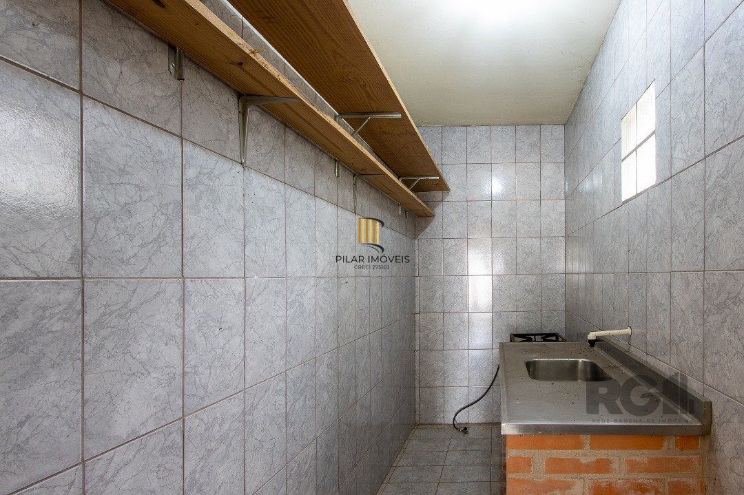 Casa 5 dormitórios no bairro Ipanema