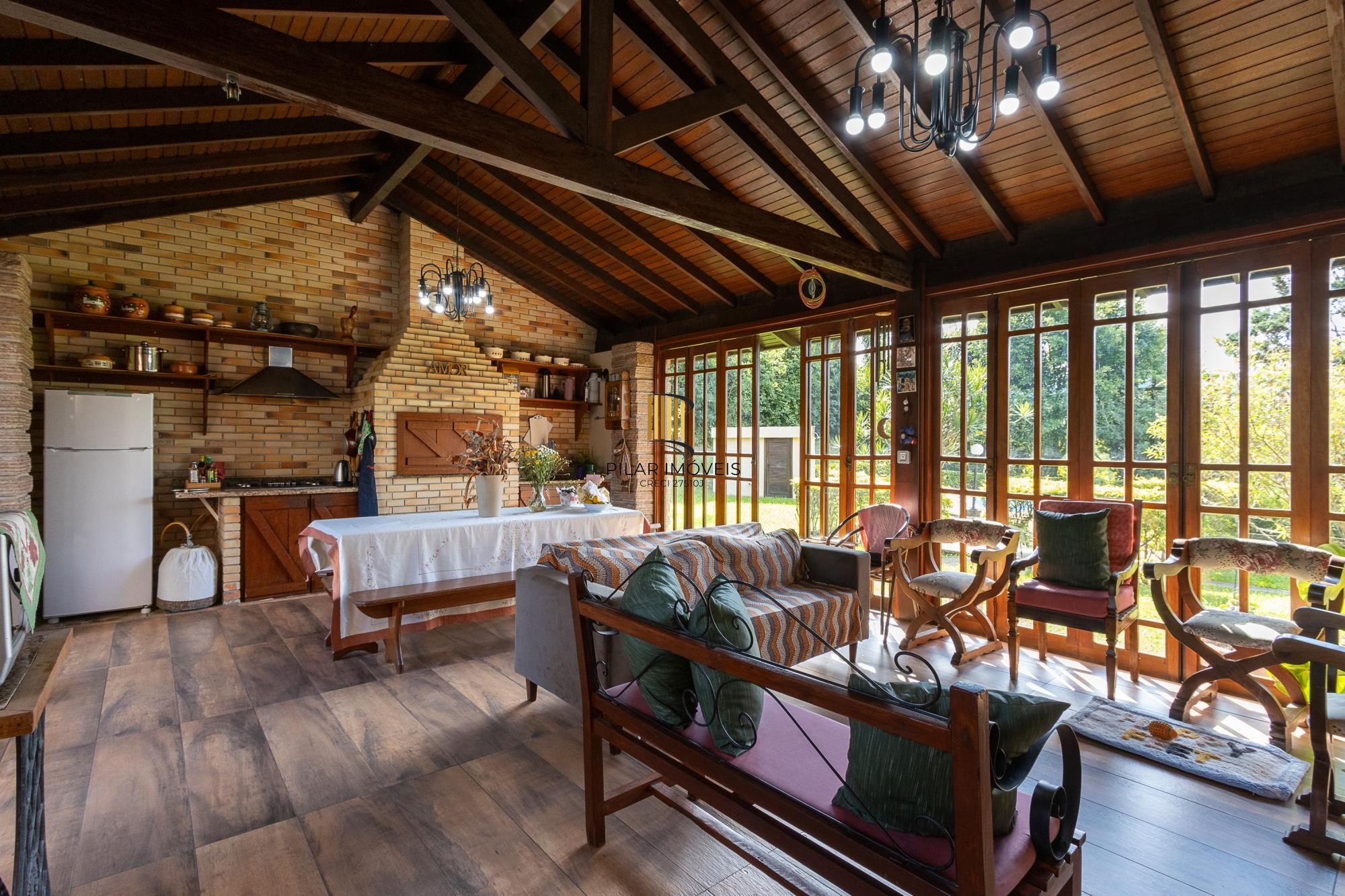 Casa em condomínio á venda com 6 dormitórios em Porto Alegre