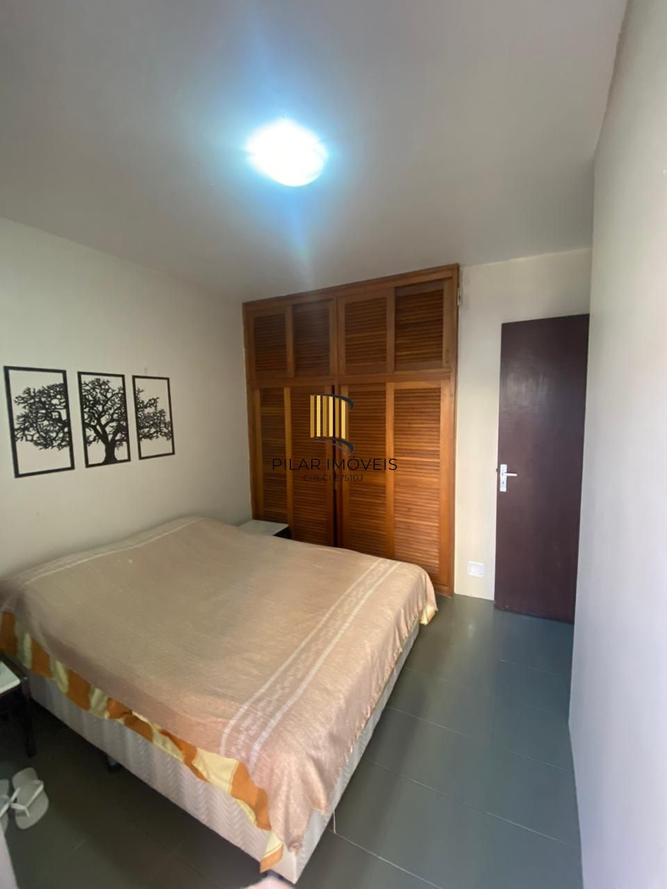 Apartamento com 2 dormitórios e garagem em Torres
