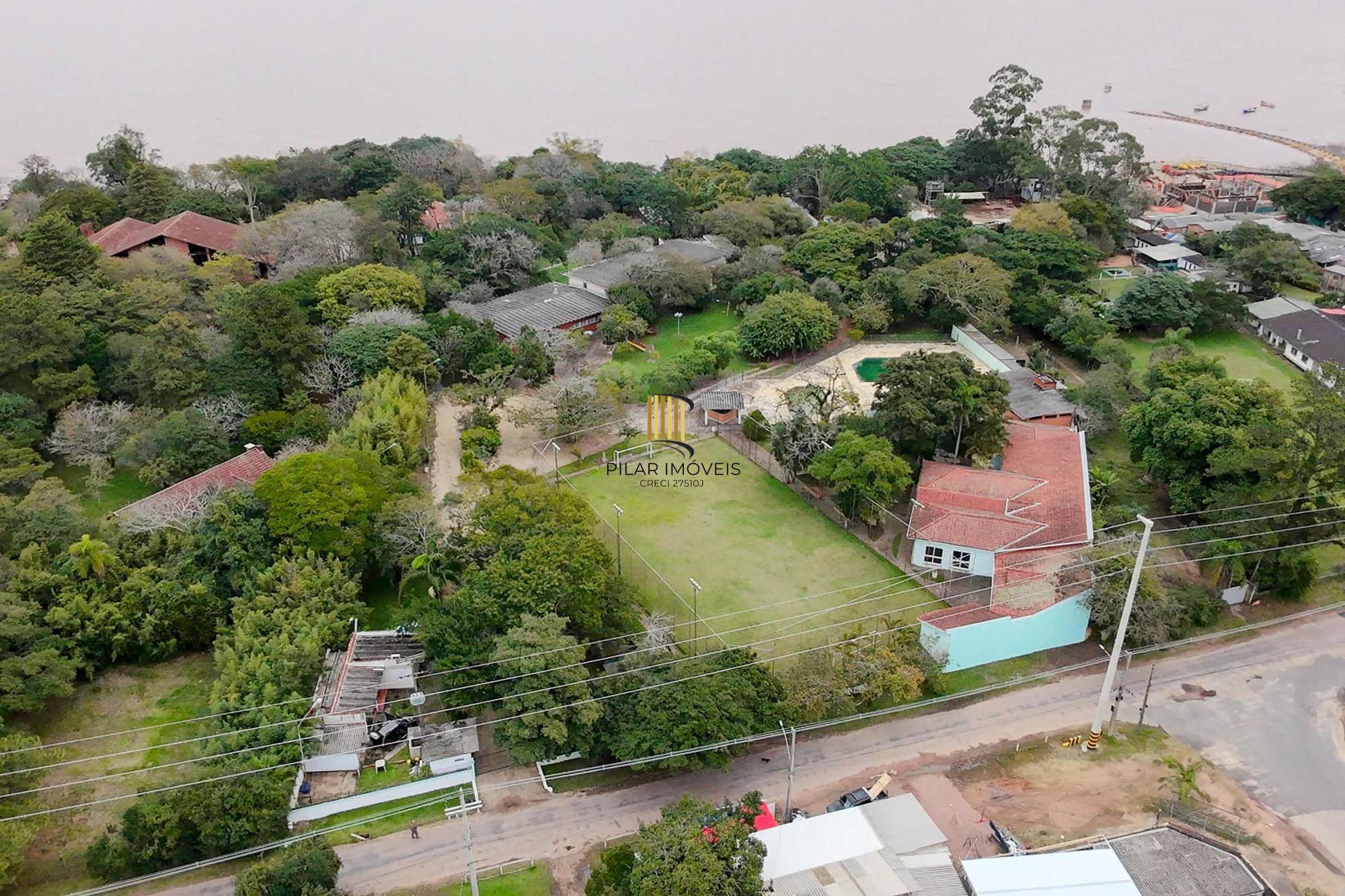 Terreno com edificações para múltiplos negócios lucrativos. - Pilar Imóveis