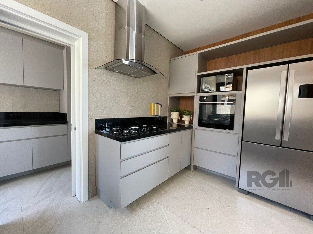 Casa de Condomínio 5 dormitórios no bairro Atlântida Sul