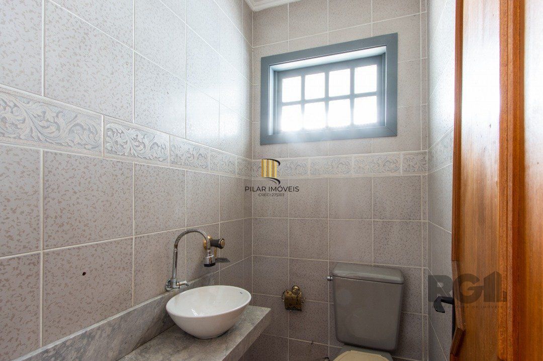 Casa 4 dormitórios no bairro Nonoai