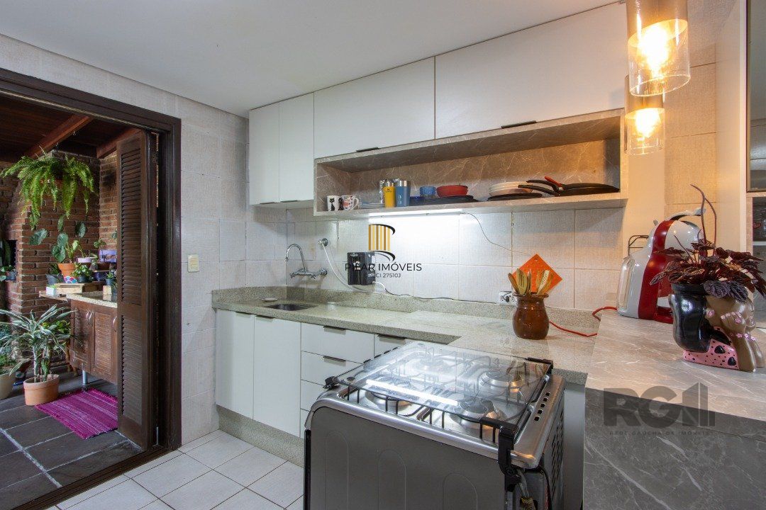 Casa 3 dormitórios no bairro Camaquã
