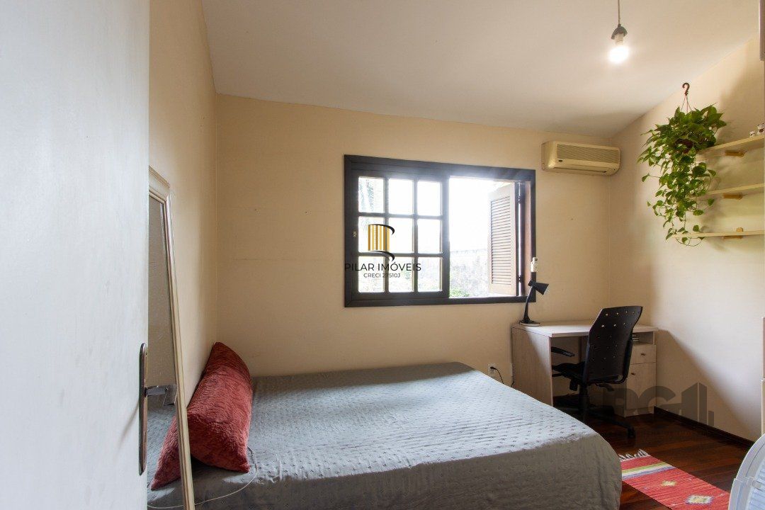 Casa 3 dormitórios no bairro Camaquã