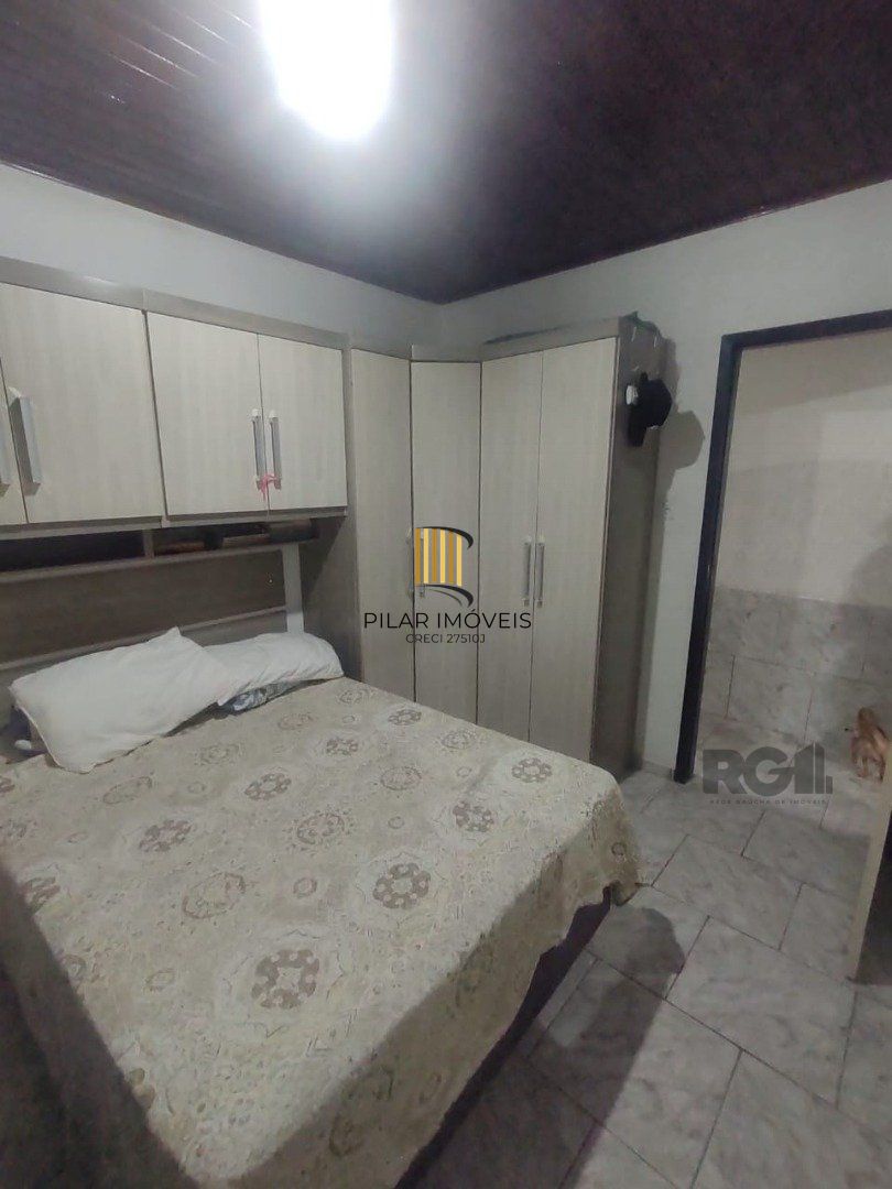 Casa de 3 dormitórios, 1 suíte e 2 vagas de garagem em Viamão.