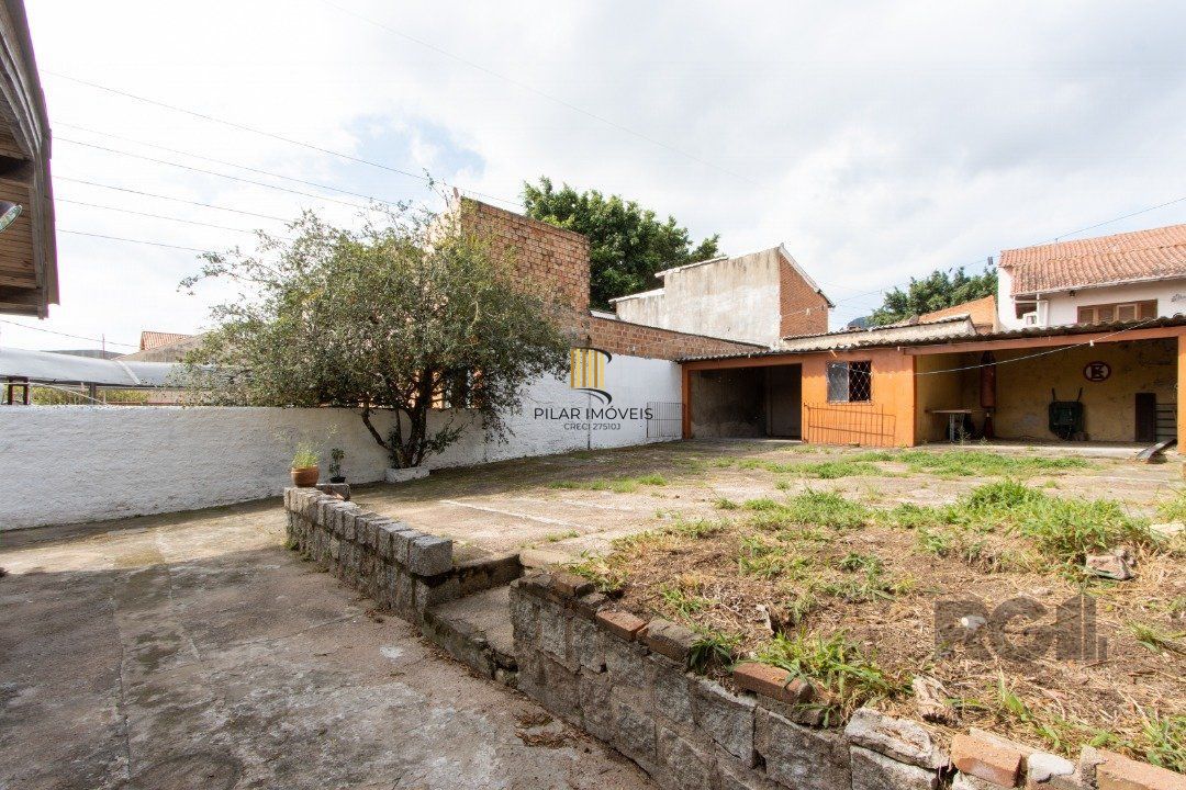 Casa 3 dormitórios, bairro Jardim Carvalho.