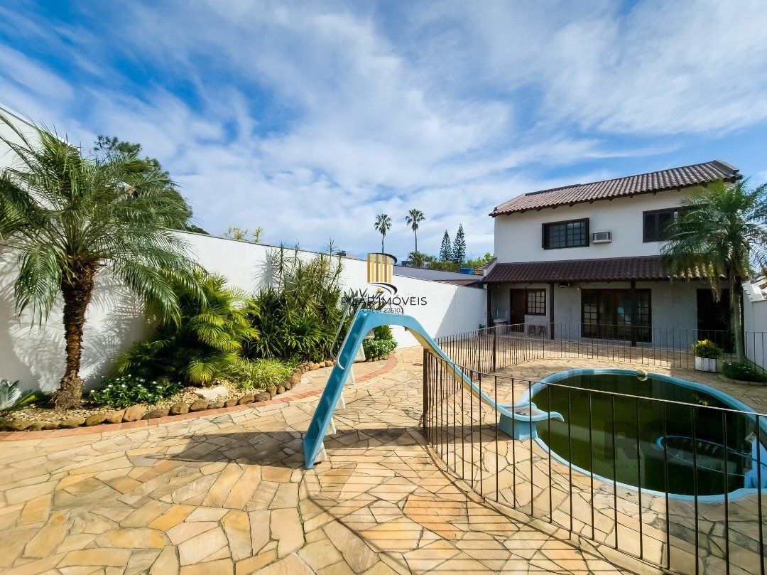 Casa 4 dormitórios no bairro Glória