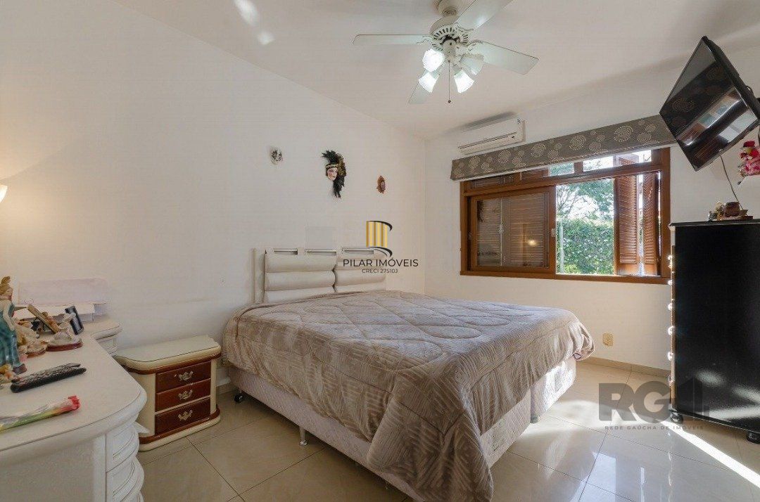 Casa de Condomínio 3 dormitórios no bairro Cavalhada