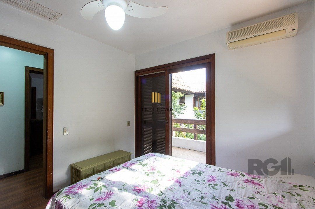 Casa de Condomínio 6 dormitórios no bairro Cavalhada