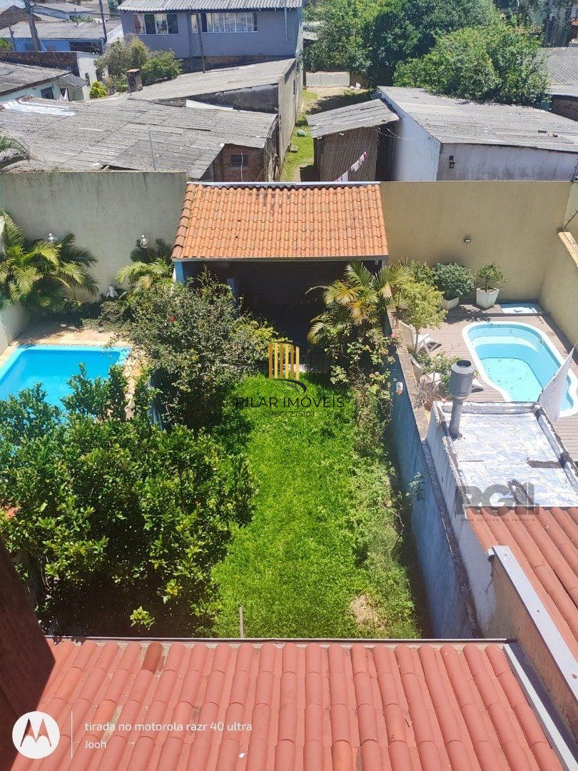 Casa 3 dormitórios no bairro Hípica