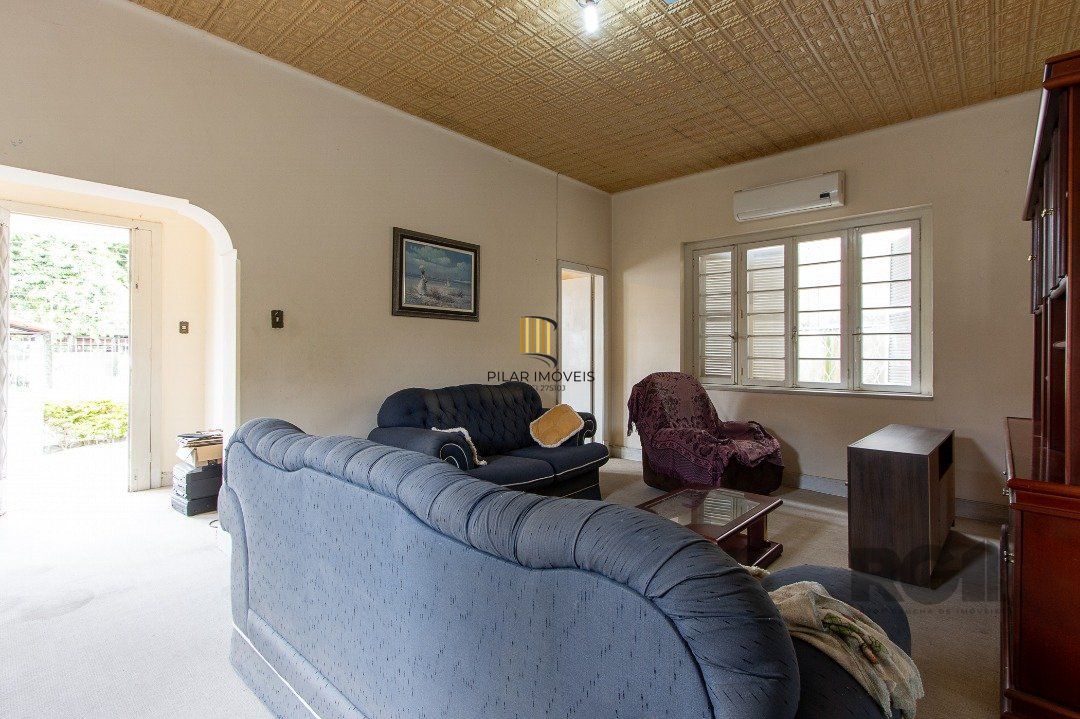 Casa 5 dormitórios no bairro Ipanema