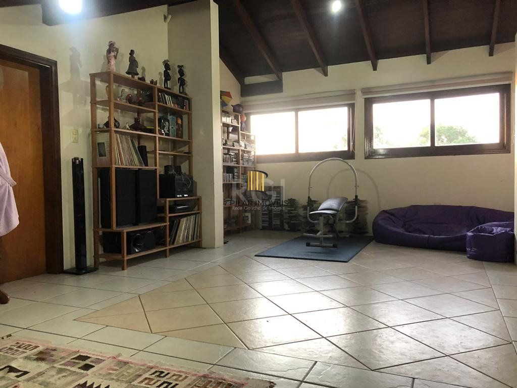 Casa de Condomínio 4 dormitórios no bairro Cavalhada
