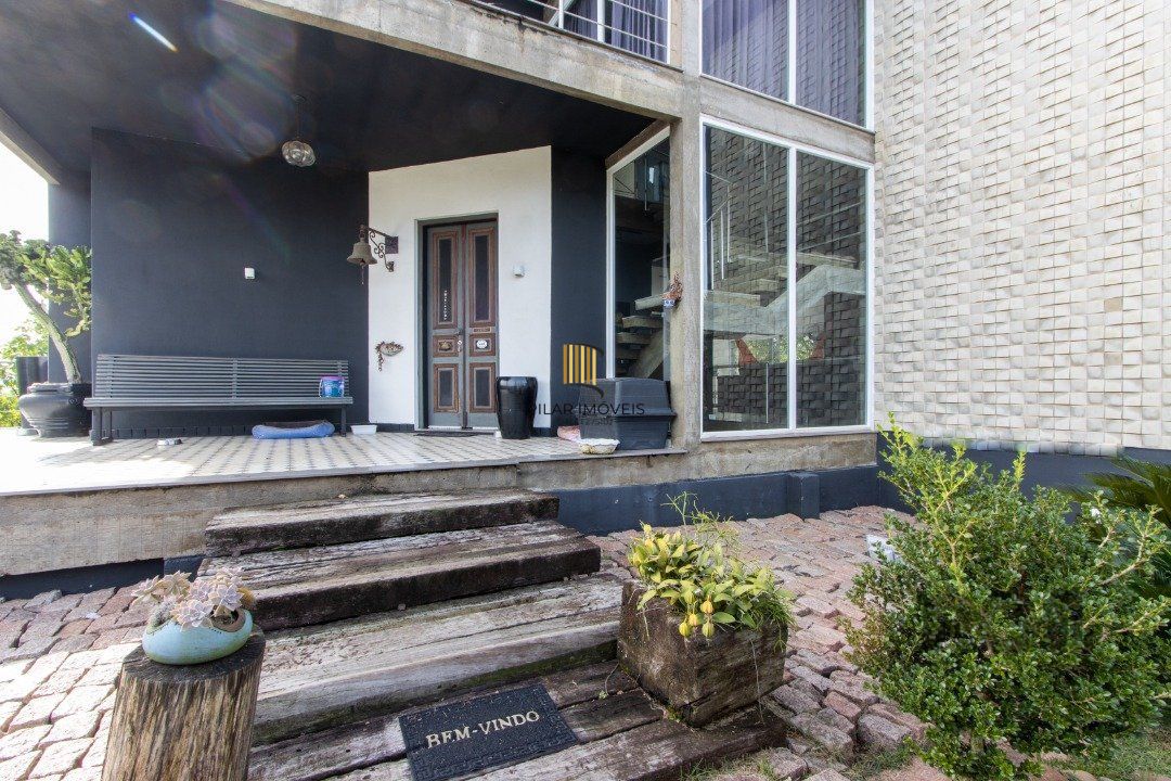 Casa de Condomínio 4 dormitórios no bairro Vila Nova
