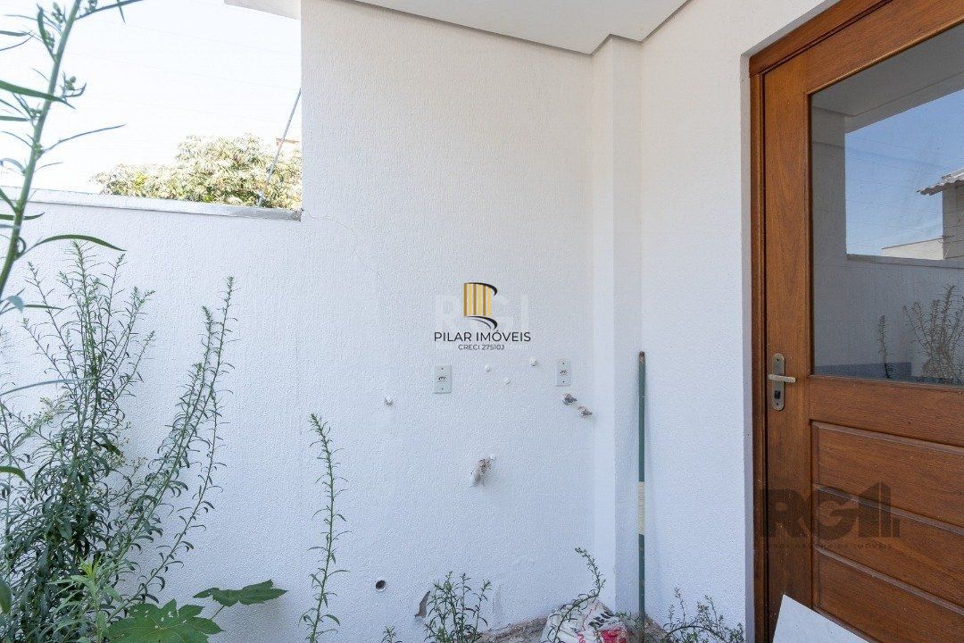 Casa 3 dormitórios no bairro Guarujá