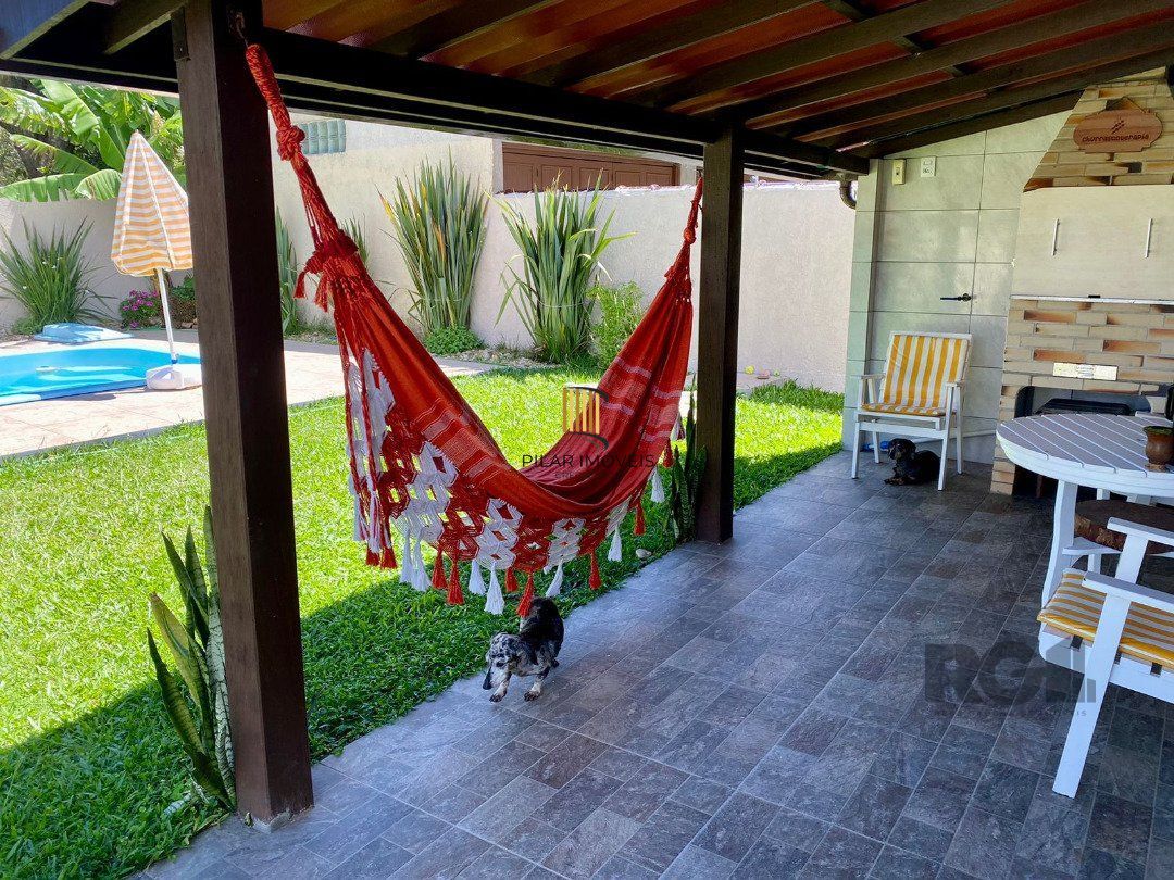 Casa 5 dormitórios, bairro Centro em Imbé.