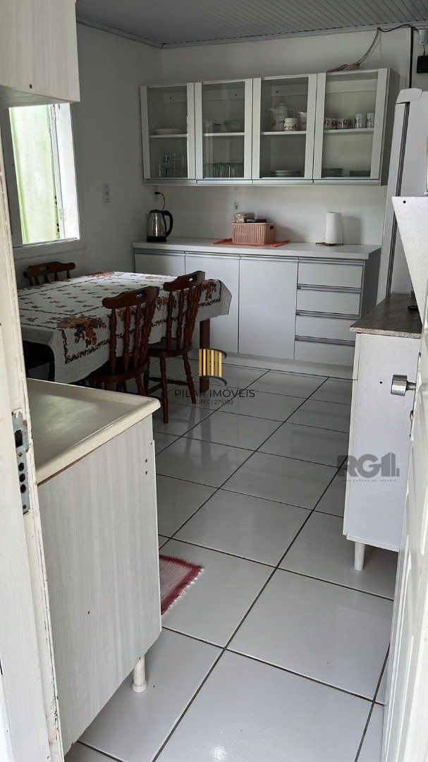 Casa 4 dormitórios no bairro Arroio Teixeira