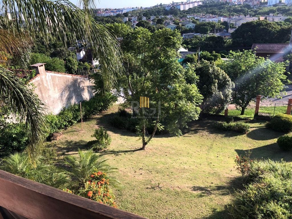 Casa de Condomínio 4 dormitórios no bairro Cavalhada