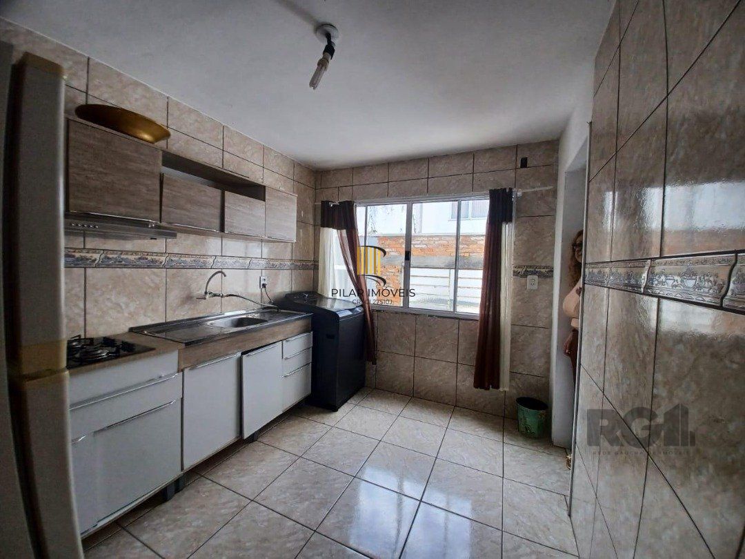 Casa 4 dormitórios no bairro Navegantes