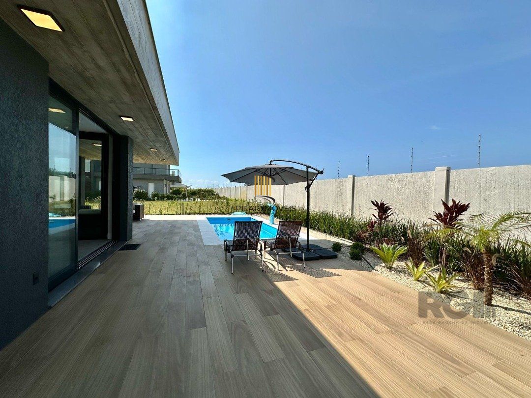 Casa de Condomínio 5 dormitórios no bairro Praia da Conceição