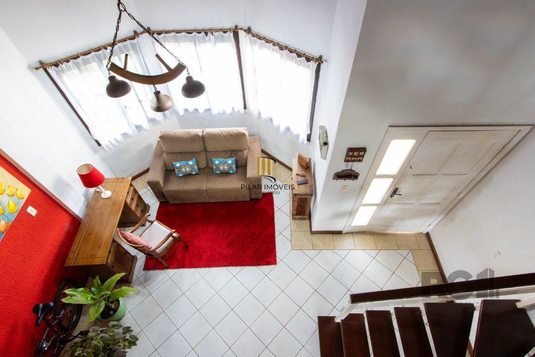 Casa 3 dormitórios no bairro Camaquã