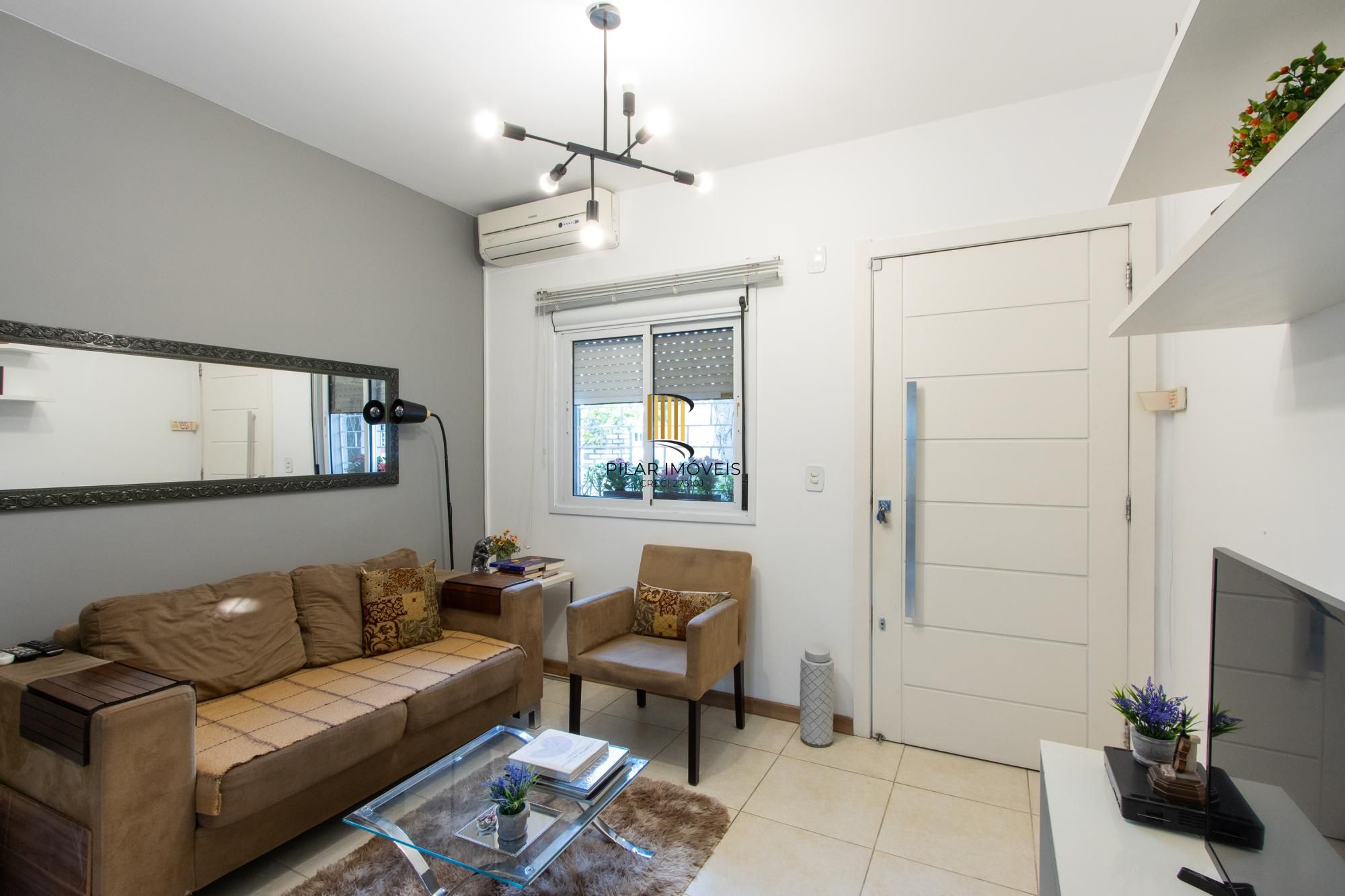 Casa de Condomínio 3 dormitórios no bairro Cavalhada