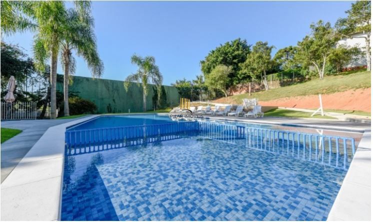 Casa em Condomínio à venda com 5 dormitórios, 565m² e 4 vagas no Condominio Jardim do Sol, Zona Sul de Porto Alegre