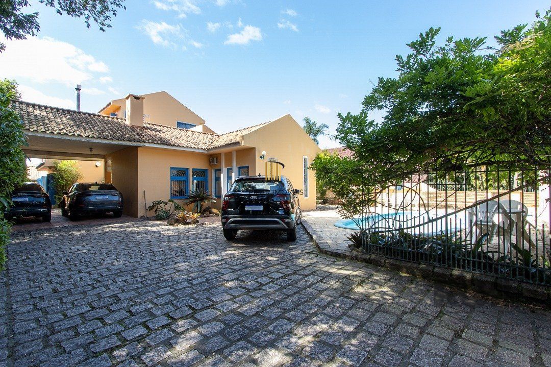 Casa 4 dormitórios no bairro Jardim Isabel - Pilar Imóveis