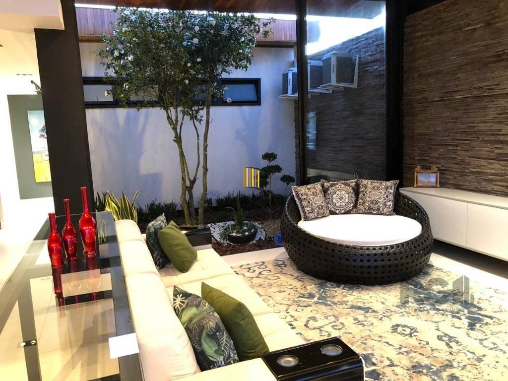 Casa de Condomínio 3 dormitórios no bairro Atlântida Sul