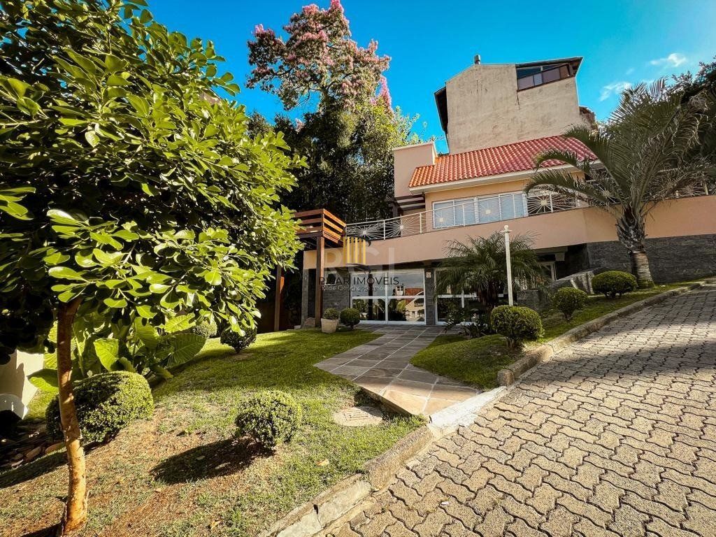Casa de Condomínio 3 dormitórios no bairro Pedra Redonda