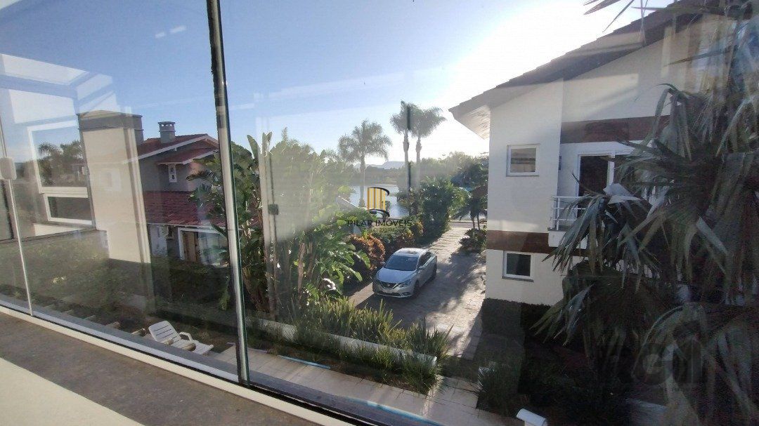 Casa de Condomínio 5 dormitórios no bairro Atlântida