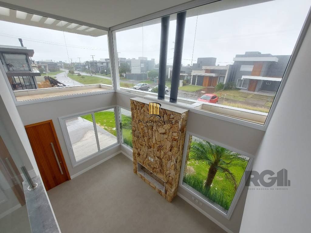 Casa de Condomínio 4 dormitórios no bairro Atlântida Sul