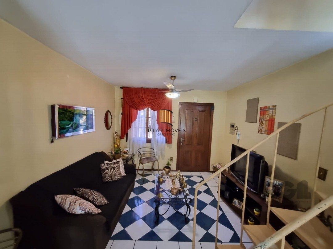 Casa de Condomínio 3 dormitórios no bairro Camaquã