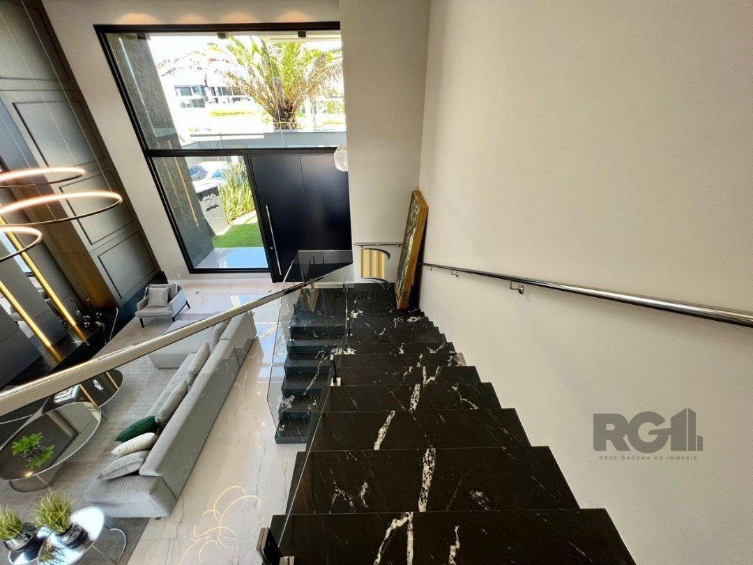 Casa de Condomínio 5 dormitórios no bairro Atlântida Sul