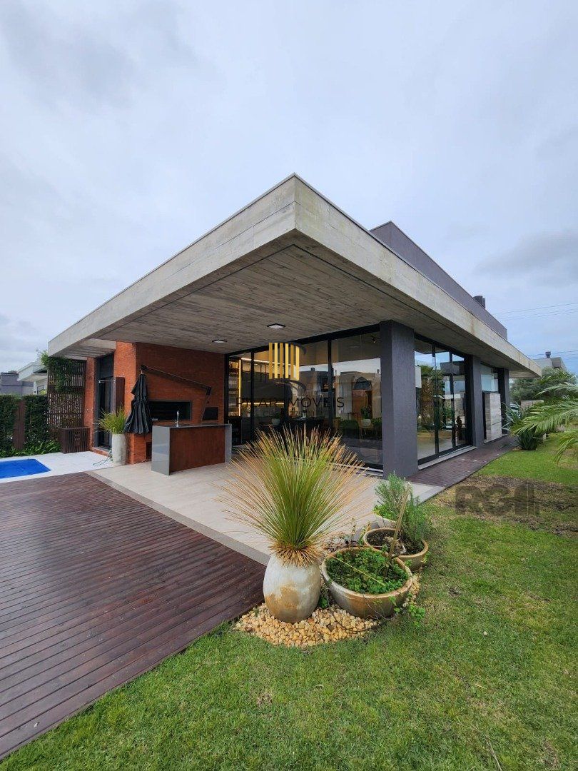 Casa de Condomínio 4 dormitórios no bairro Capão Ilhas Resort