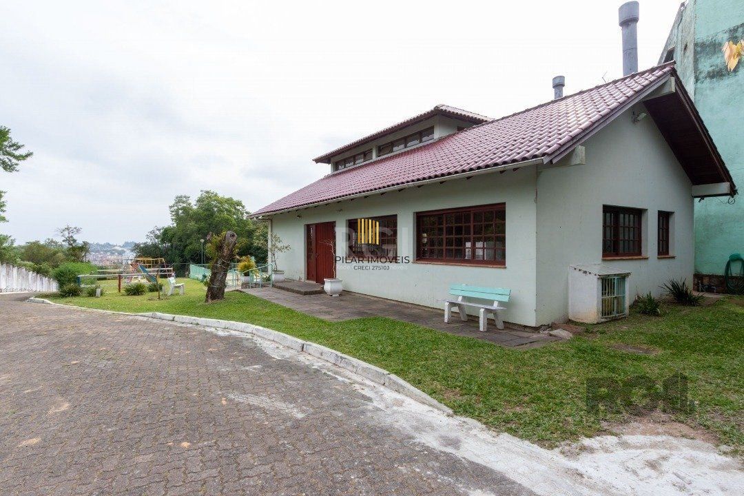 Casa de Condomínio 4 dormitórios no bairro Cavalhada