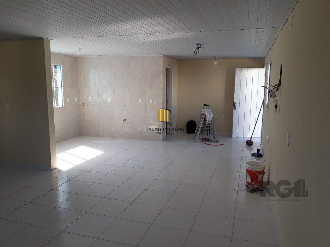 Oportunidade Imperdível: Prédio com 4 Apartamentos, Pátio e 2 Vagas de Garagem