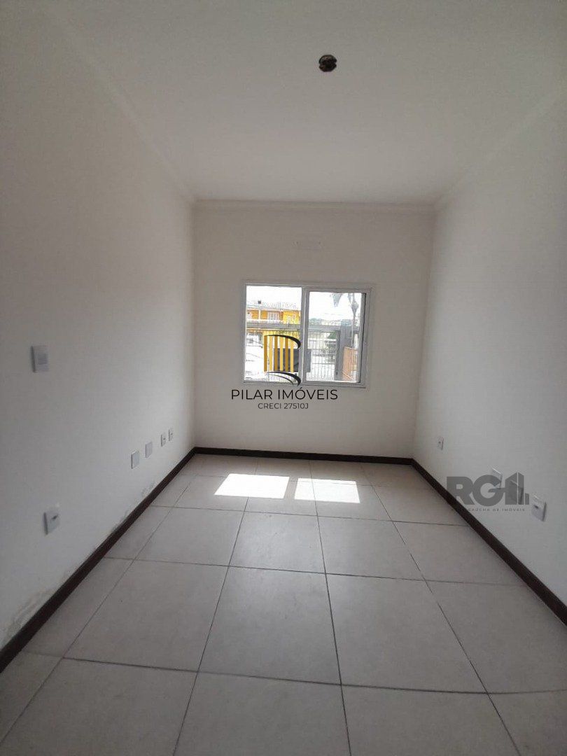 Casa 3 dormitórios no bairro Camaquã