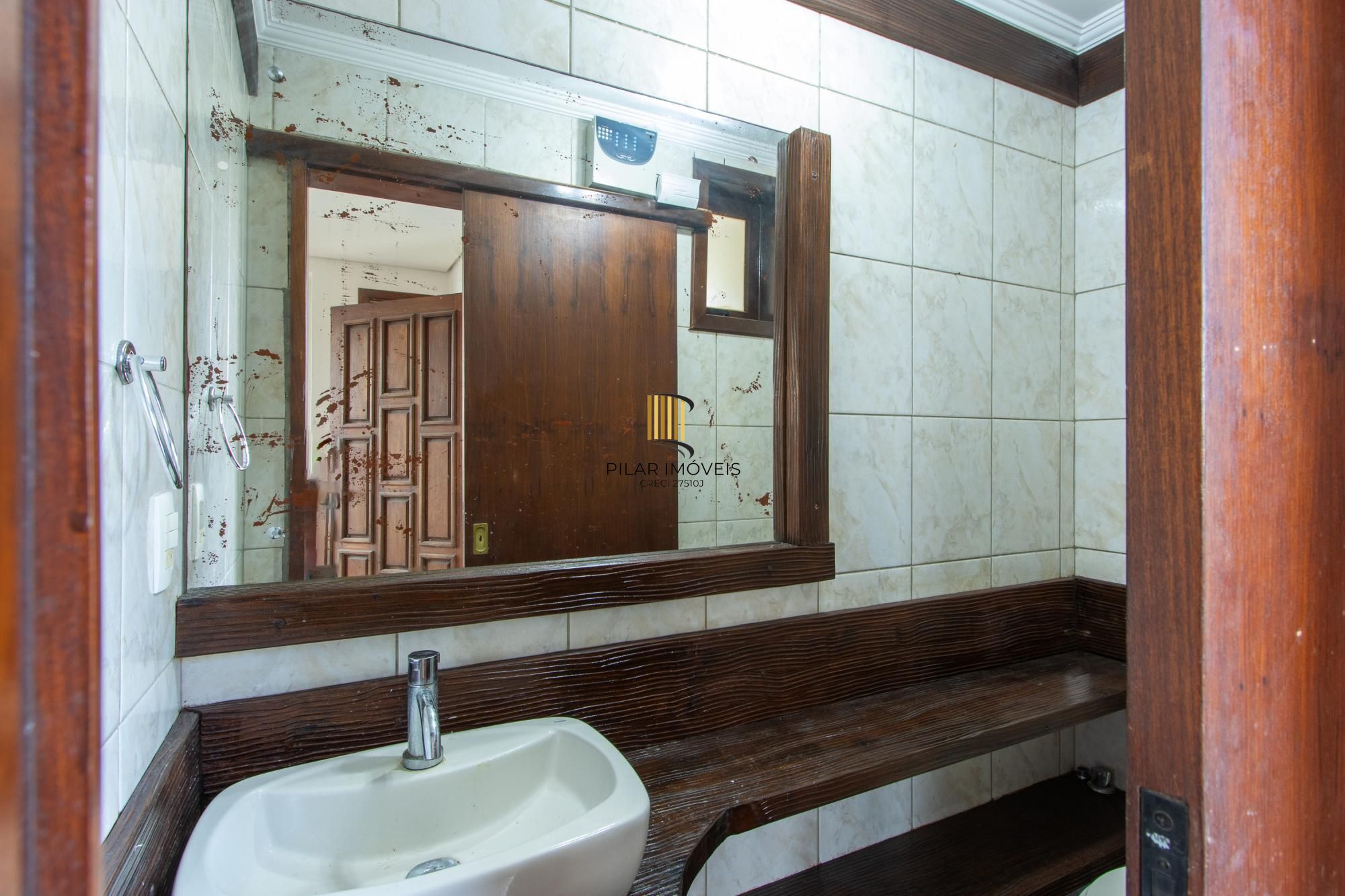 Casa de Condomínio 3 dormitórios no bairro Cristal