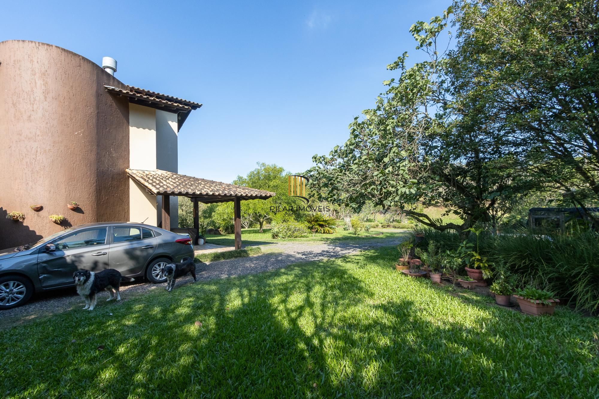 Casa em condomínio á venda com 6 dormitórios em Porto Alegre