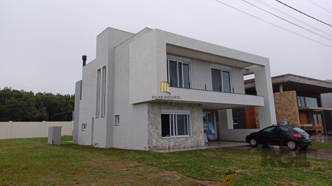 Casa de Condomínio 4 dormitórios no bairro Praia da Conceição