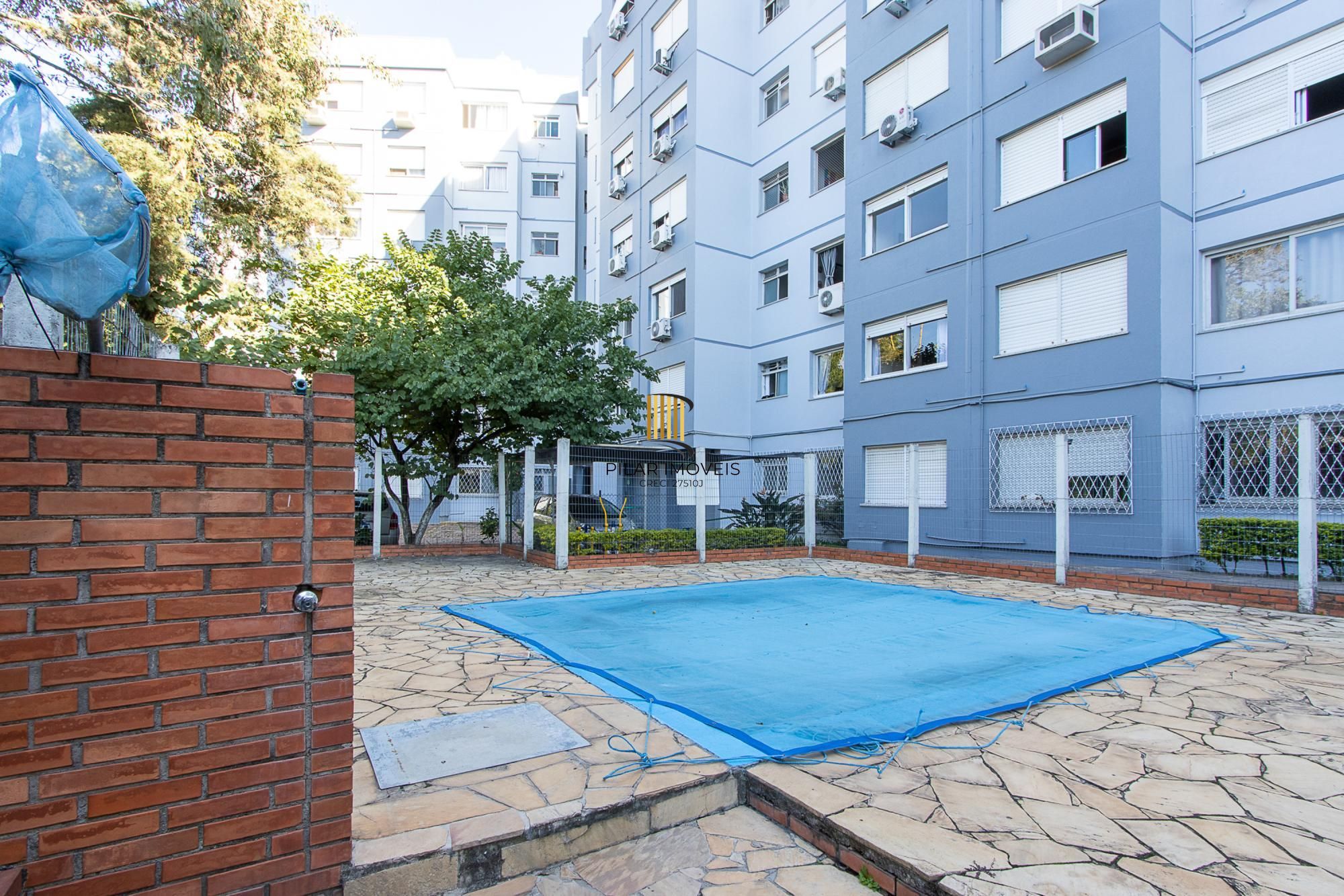 Apartamento de 2 quartos, living, cozinha planejada, área de serviço e 1 vaga.