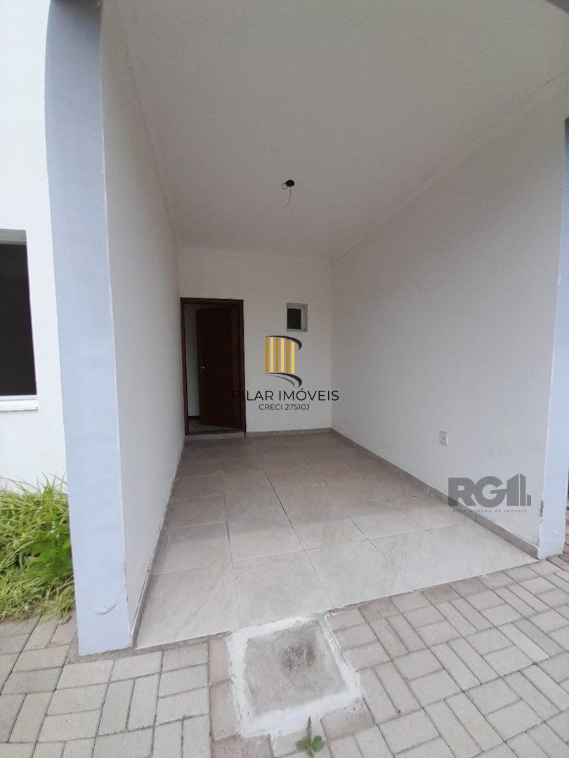 Casa 3 dormitórios no bairro Camaquã