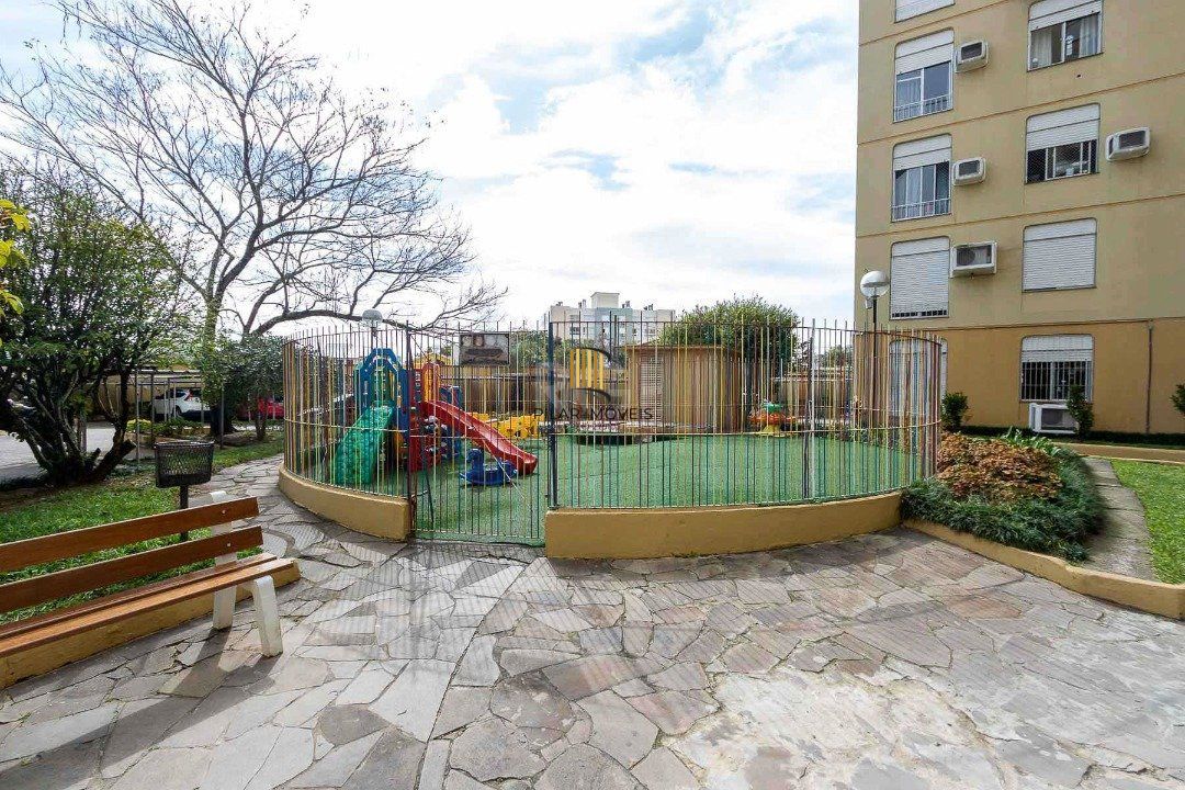 Apartamento de 1 dormitório, living, cozinha, área de serviço e banheiro social.