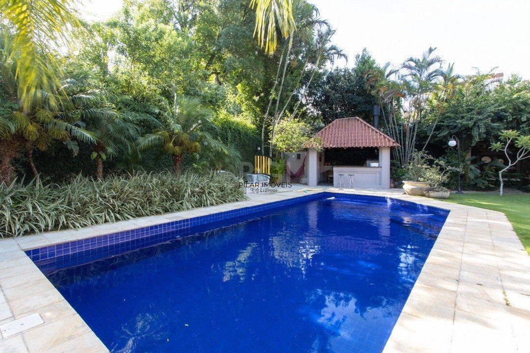 Casa de Condomínio 8 dormitórios no bairro Cavalhada